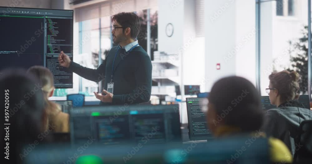 Poster Young Handsome Teacher Giving a Lecture About Software Engineering to a Group of Smart Diverse University Students. International Undergraduates Sitting Behind Desks with Computers