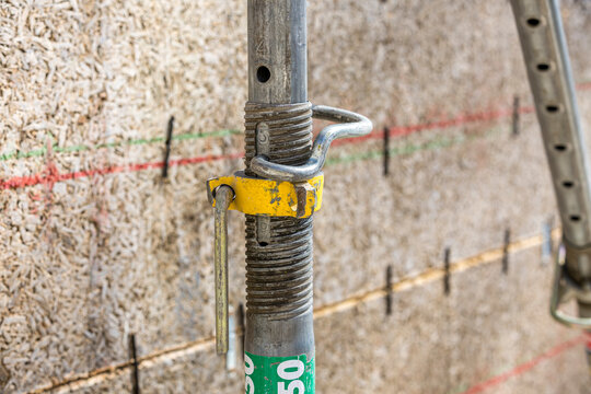 Scaffolding pipe clamp and parts, part of a construction site in Graz, Austria.
