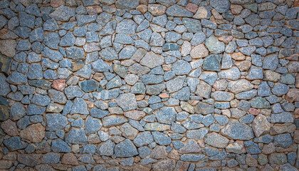 Texture of a stone wall. Old castle stone wall texture background. Stone wall as a background or texture.