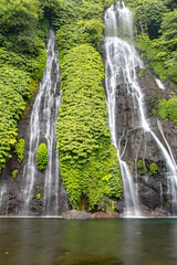 Banyumala Waterfall in Bali island in the middle of the lushing jungle