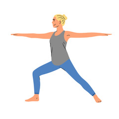 Jeune femme blonde qui fait une posture de yoga à la maison
