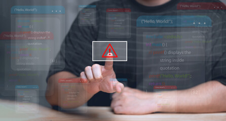 Computer hack warning,System hacked warning alert on notebook (Laptop),cyber security concept,The danger of malware viruses,ransomware virus,triangle caution warning sign notification error..
