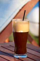 frappe in a glass on the table