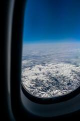 View from the airplane window. View from the window of an airplane during a flight in daylight at high altitude.
