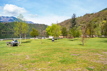 Fototapeta na wymiar View of the Levico lake park. Trentino Alto Adige, Italy