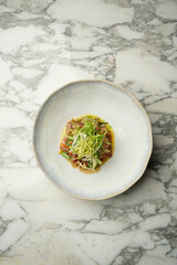 Fresh vegetable salad with Cod liver and ruccola