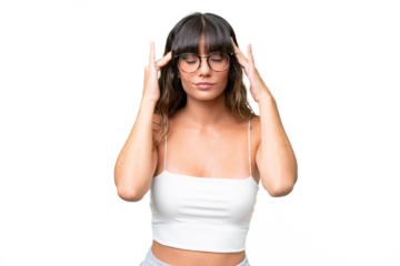 Young caucasian woman over isolated background with headache
