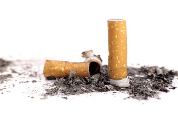 Cigarette butts with ashes on a white background