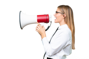 Young business caucasian woman over isolated background shouting through a megaphone