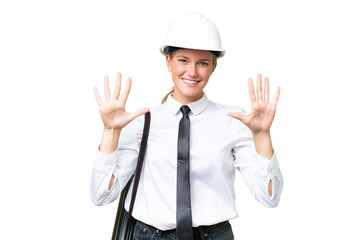 Young architect caucasian woman with helmet and holding blueprints over isolated background counting ten with fingers