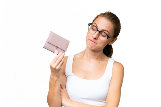 Young caucasian woman holding a wallet over isolated background with sad expression