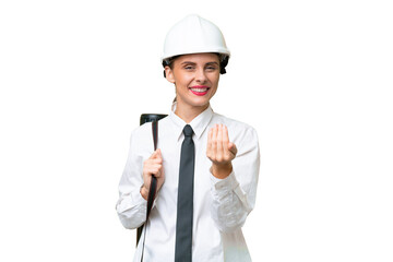 Young architect woman with helmet and holding blueprints over isolated background inviting to come with hand. Happy that you came