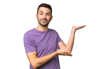 Young handsome caucasian man over isolated background extending hands to the side for inviting to come