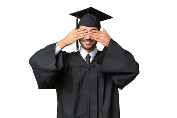 Young university graduate man over isolated background covering eyes by hands