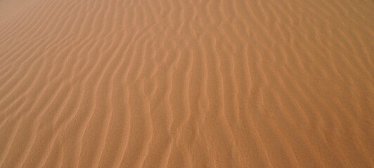 Desert art, interesting structures painted by the wind in the sand of the desert.