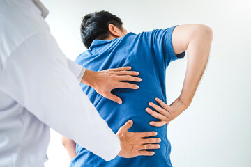 Physical Doctor consulting with patient About  muscule pain problems Physical therapy diagnosing...