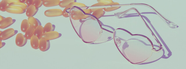 sun protection pills and sunscreen supplements, health care concept. summertime style. yellow pills and sunglasses on green background. banner