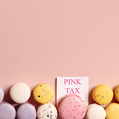 pink tax concept. big pink dessert and small desserts on beige background. comparison style. square copy space