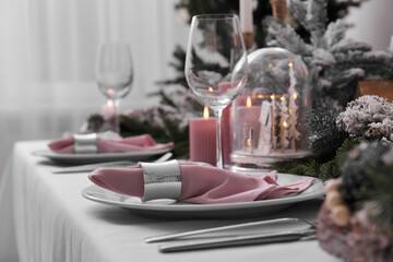 Beautiful festive table setting with Christmas decor indoors, space for text