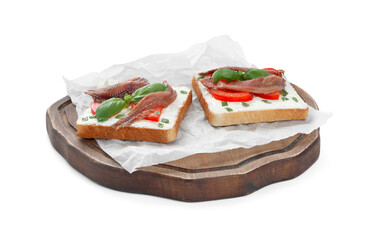 Delicious sandwiches with cream cheese, anchovies, tomatoes and basil on white background