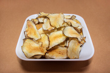 Homemade organic Jerusalem artichoke chips snack.