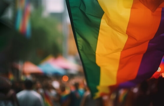 Pride parade, city scene, flag in rainbow colors, people, selective focus. Generative AI