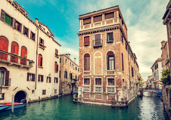 Fototapeta na wymiar Floating house on canal in Venice, Italy