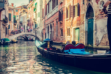 Fototapeta na wymiar Gondola on canal in Venice, Italy.
