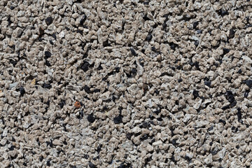 Crushed granite stones wall - close up