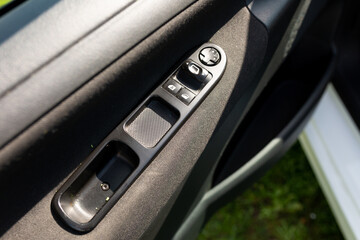 Obraz na płótnie Canvas power window and lock control buttons on the car door