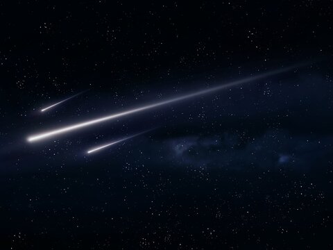 Beautiful meteorites in starry night sky. Three meteoroids on a black background. Meteor glowing trails.