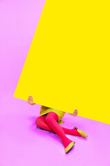 Female legs in colorful tights over yellow and pink background. Empty space for text. Pop art photography. Concept of art, creative vision, fashion. Complementary colors. Banner. Copy space for ad