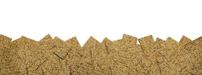 a heap of crispbread on a white background for banner, panorama or border