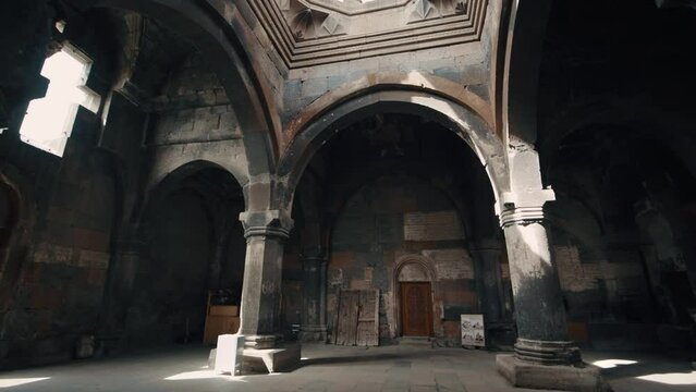 Panning through the columns of Hovhannavank monastery and showing the interior