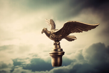 Fototapeta premium Golden eagle statue, symbol of freedom and independence