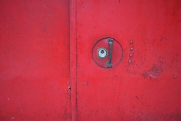 red door with door lock and doorknob design for security concept