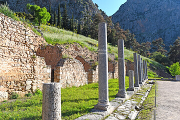 Ancient Roman forum colonnade on the central public space, The Agora, at Sanctuary of Apollo, it was the center of the athletic, artistic, spiritual and political life of the city, Delphi, Greece
