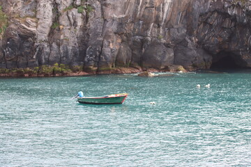 Fototapeta na wymiar Boat in the bay of Camara de Lobos on Madeira