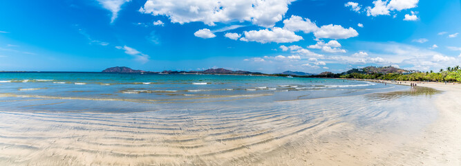 A panorama view across the beach at Tamarindo in Costa Rica in the dry season