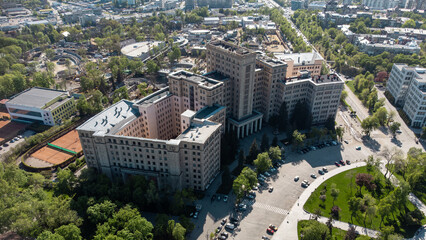 Aerial look down view on Karazin University building located on Freedom (Svobody) Square near green park and zoo. Kharkiv city in spring, Ukraine