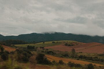 landscape of the mountains in the middle of the foggy