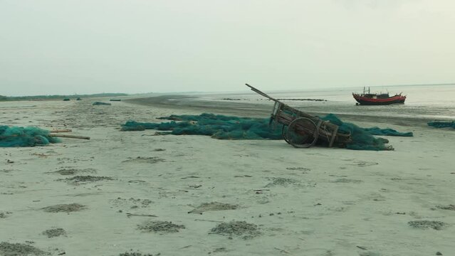 Fishing Nets, Cart, and Boats on Quiet Bakkhali Sea Beach, West Bengal, India