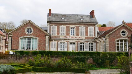 Fototapeta na wymiar Ancienne école des filles du village de Long en Picardie dans le département de la Somme en France Europe