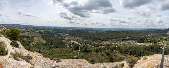 Baux-De-Provence, France - 04 21 2023: Panoramic view from the rocky limestone spur of the Les Baux...