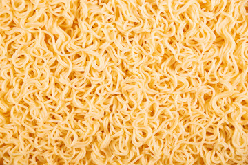 Texture of curly noodles. Food background.