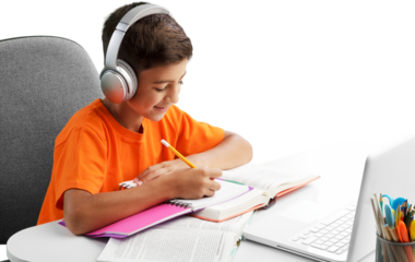 Smiling little child in headphones have a video call distant class using a laptop