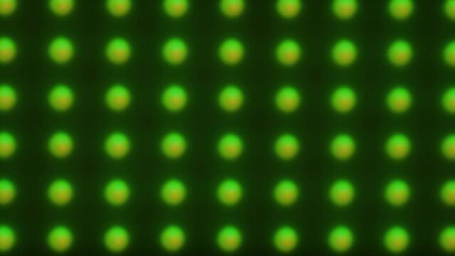 multi-colored diode flashlight burning in the dark