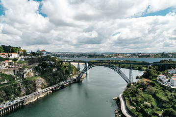 Oporto, Portugal. April 13, 2022: Maria Pia Bridge and San Joao Bridge.