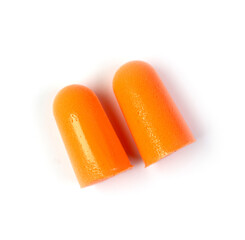 Orange earplugs isolated on white, top view