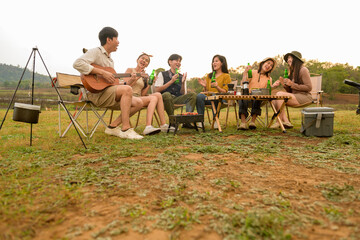 Group of young  Asian people are enjoy camping in natural campsite